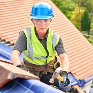 Image of woman roofer working for safety services A.R.M. action resource management