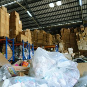 Image of piles of trash in warehouse for keeping a clean workspace A.R.M. action resource management