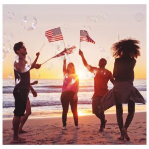 Friends on the beach waving American flags for Independence Day USA A.R.M. action resource management