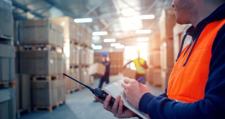 Image of warehouse worker with notepad and walkie-talkie with blurry coworkers just beyond, among boxes. SAFETY MASHUP: GENERAL SAFETY TIPS FOR WAREHOUSE WORKERS Safety mashup A.R.M. Action Resource Management Safety training