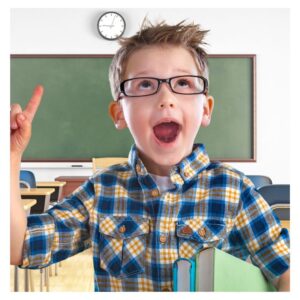 Image of upbeat happy little boy wearing glasses in classroom. Children’s Eye Health and Safety