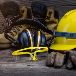 Image shows a variety of PPE, including work boots, hard hat, goggles, and heavy-duty gloves. A.R.M. Action Resource Management.