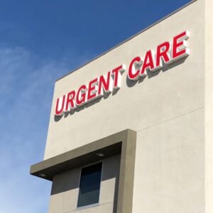 This is a picture of a building with a red sign, “URGENT CARE.” Emergency Room or Urgent Care ER A.R.M. Action Resource Management Safety training, OSHA training