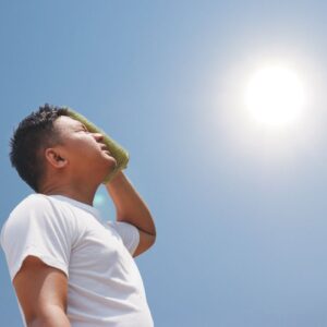 A delivery driver feels woozy from being dehydrated.