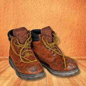 Work boots on a wooden floor