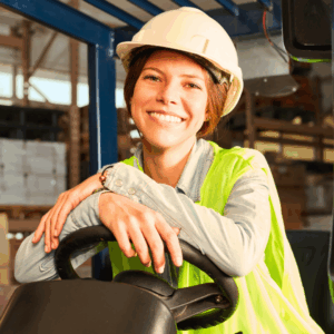 Woman forklift operator in warehouse. Power Up Safely: Best Practices for Using Power Tools in Warehouses
